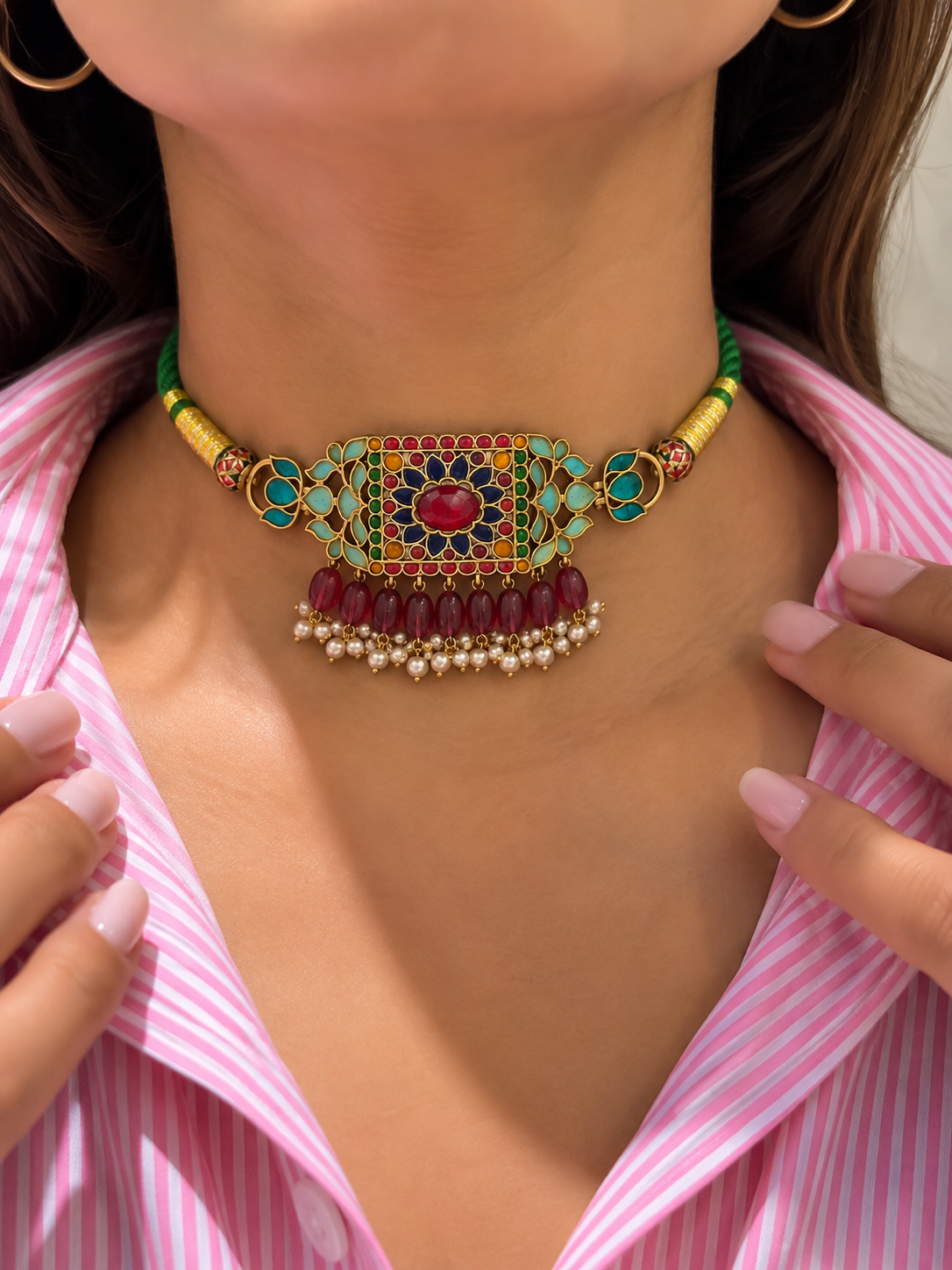 Multicolour Meenakari Kundan choker with red green stones and pearl drops worn on a model