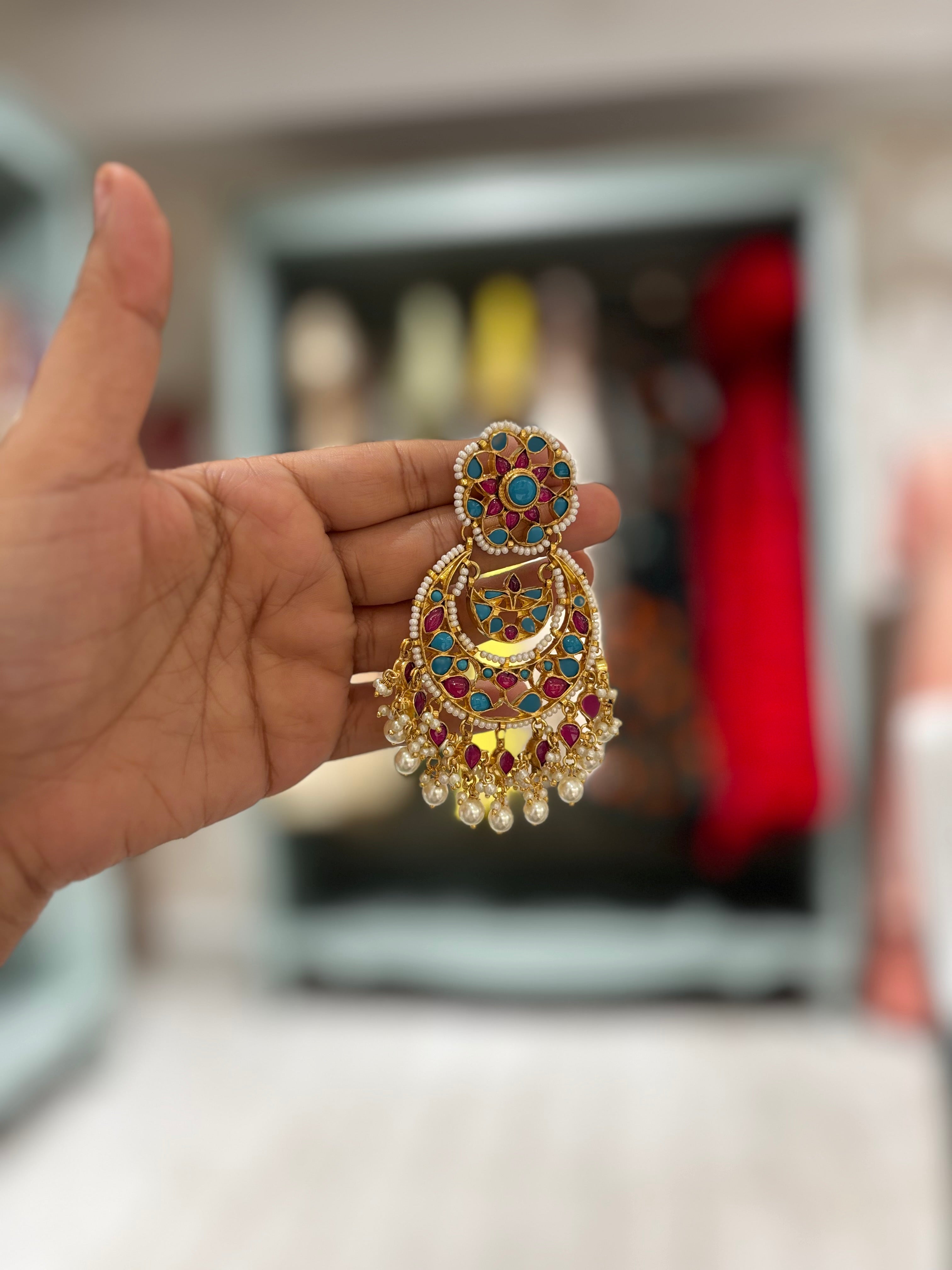 
Handcrafted turquoise and ruby Polki Chandbali earrings with pearl drops and intricate traditional detailing by Naazuk