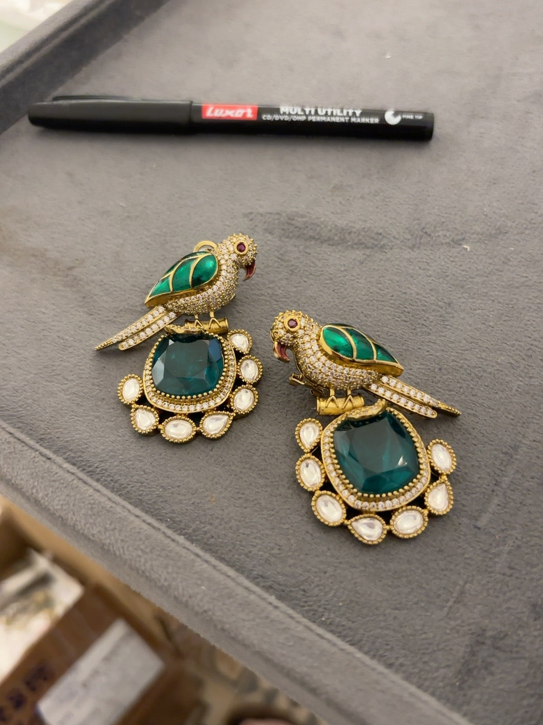 Avenya parrot statement earring