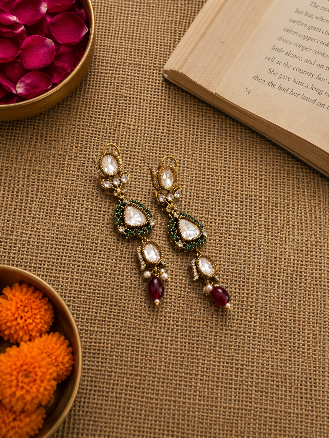 Victorian polki choker featuring emerald detailing and ruby bead drops in an antique finish.