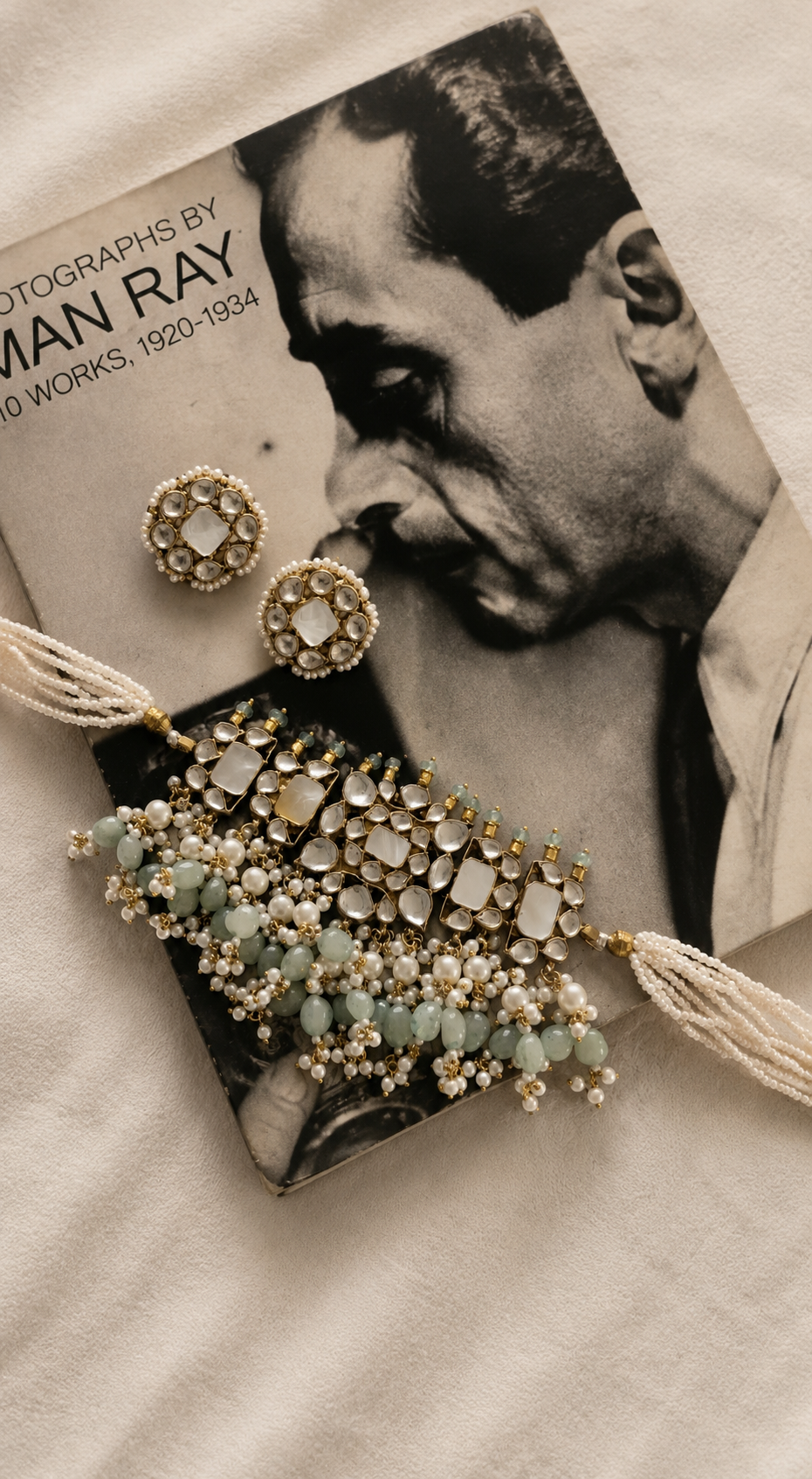 Handcrafted Mother of Pearl Polki choker necklace with matching earrings featuring pearl accents, aqua Mother of Pearl stones, and adjustable dori by Naazuk Jewels.