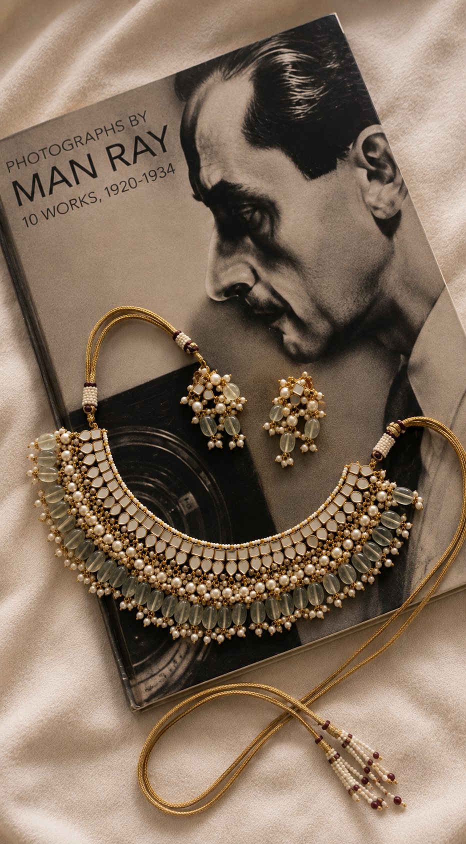 Handcrafted Mother of Pearl Polki collar necklace with pearl detailing, translucent gemstone accents, matching earrings, and adjustable dori by Naazuk Jewels.